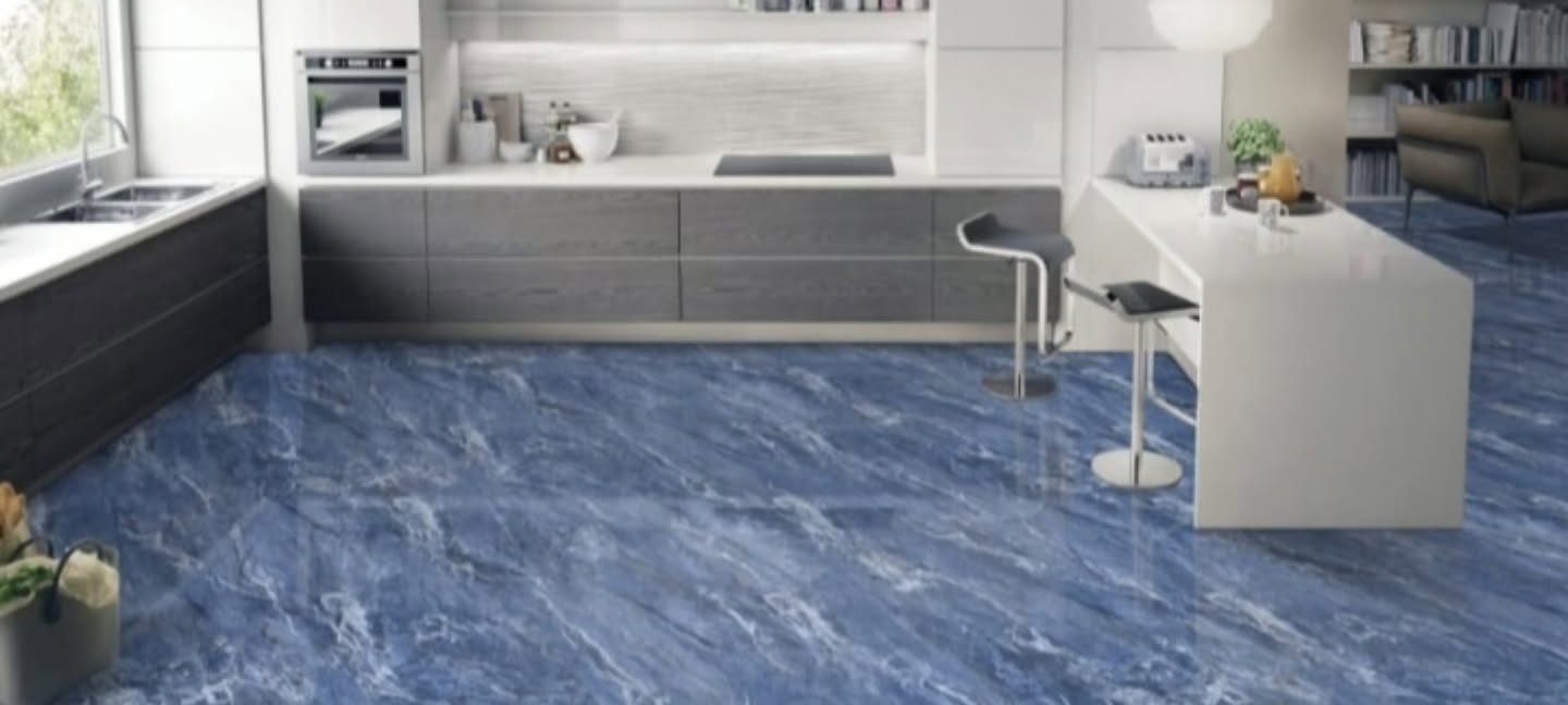 Modern kitchen with cobalt blue glossy vitrified floor